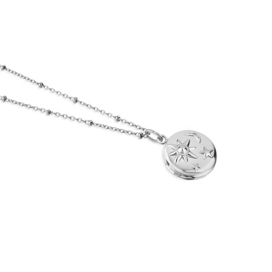 NEWBRIDGE SILVER PLATED LOCKET WITH SUN MOON & STARS