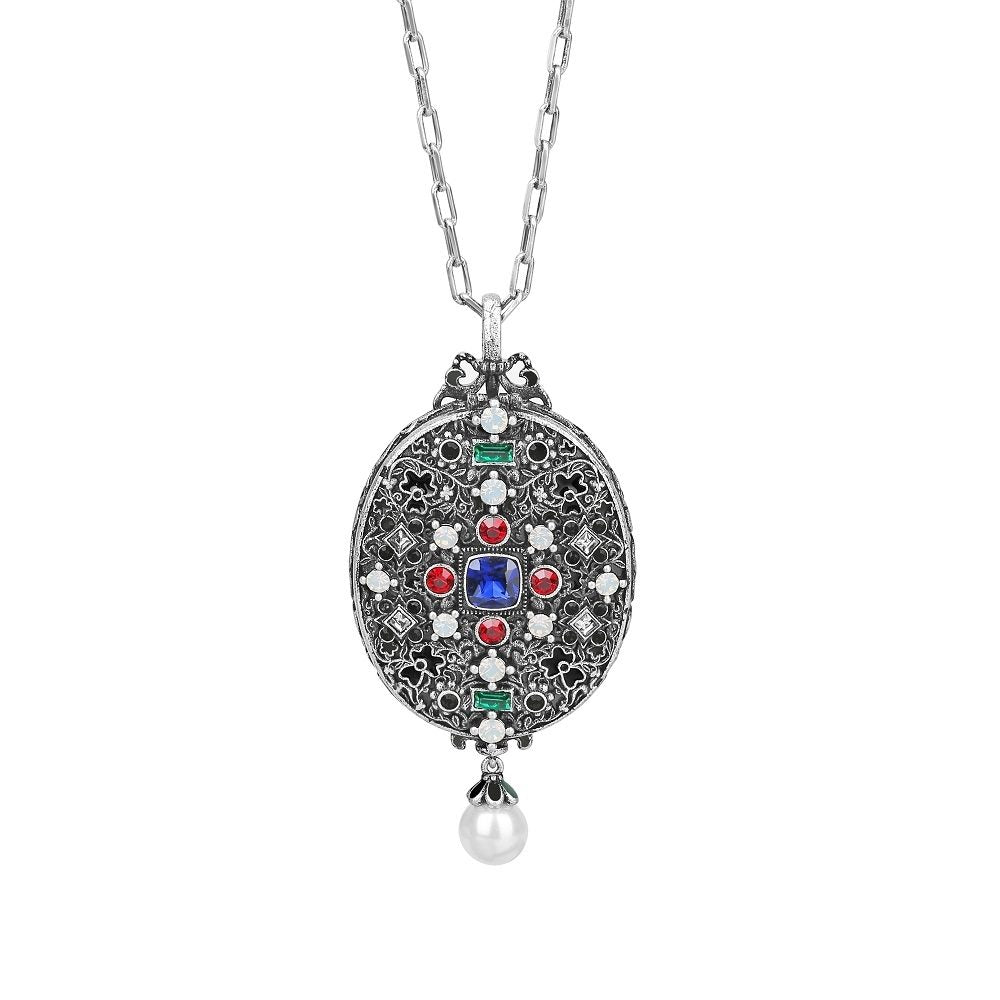 NEWBRIDGE ORNATE LOCKET WITH COLOURED STONES